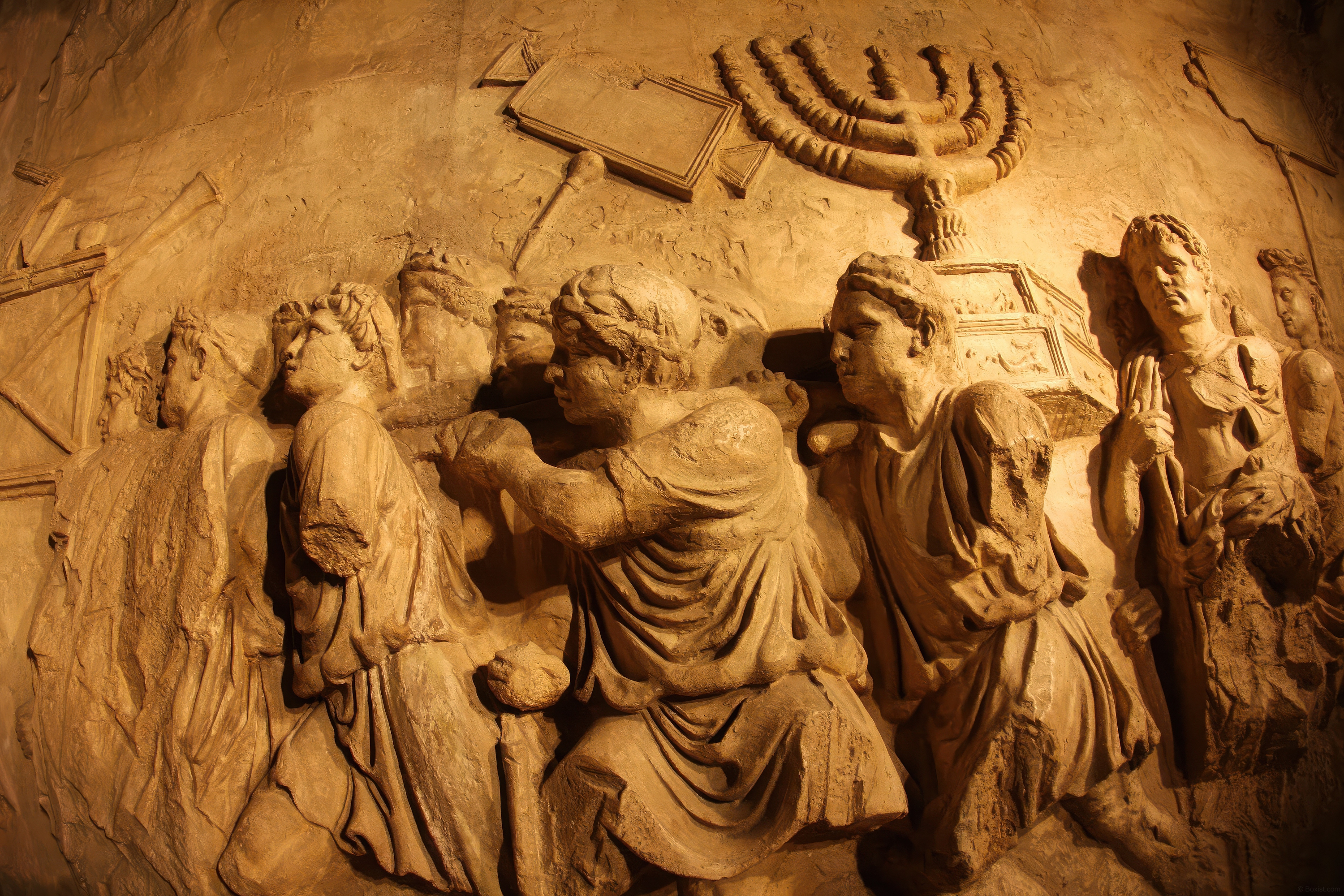 Relief Of The Spoils Of Jerusalem From The Arch Of Titus Featuring Roman Soldiers And Temple Menorah / Sam Mugraby